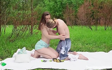 Outdoor romance after a sensual foreplay in the grass